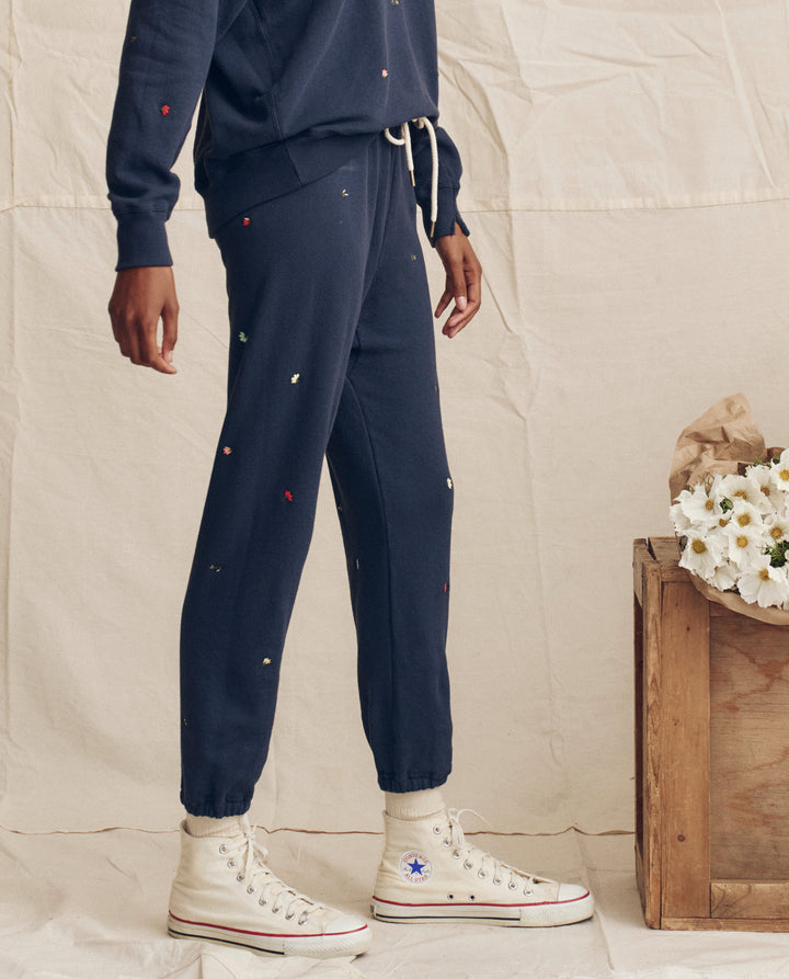 The Stadium Sweatpant with tossed Floral Embroidery - Navy